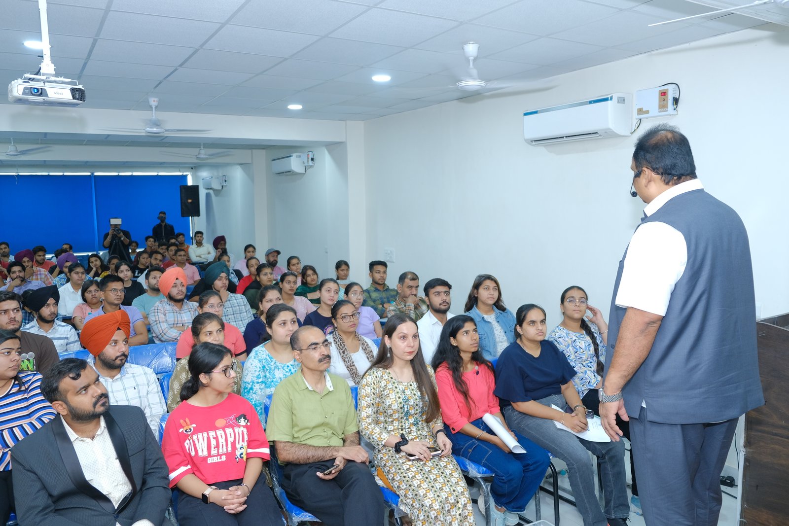 Students attending a seminar session in the classroom